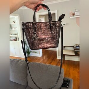 Faux snakeskin Guess bucket purse, with removable shoulder strap. Like new.